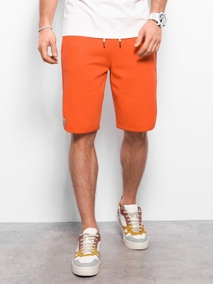 Men's sweat shorts trimmed with piping - orange V5 W360