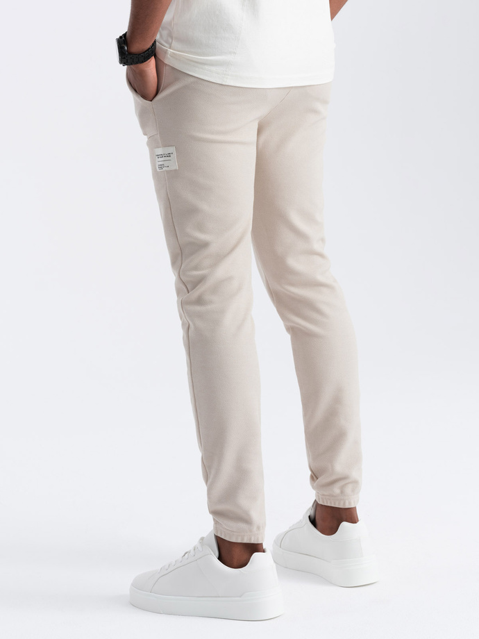 Men's structured knit sweatpants - light beige V1 OM-PASK-0211
