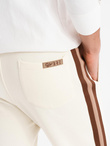 Men's sweatpants with piping and ribbing on the legs - cream V3 OM-PASK-0258