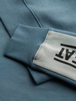 Men's sweatshirt with contrasting stripes and raglan sleeves - bleached turquoise V4 OM-SSNZ-0200