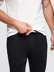 Męskie spodnie dresowe typu jogger - czarne V5 OM-PABS-0173