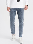 Męskie spodnie jeansowe marmurkowe z surowo wykończoną nogawką SLIM FIT - ciemnoniebieskie V4 OM-PADP-0146