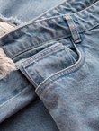 Męskie spodnie jeansowe TAPERED FIT z dziurami – jasnoniebieskie V1 OM-PADP-0175