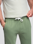 Spodnie męskie dresowe typu jogger - zielone V3 OM-PABS-0173