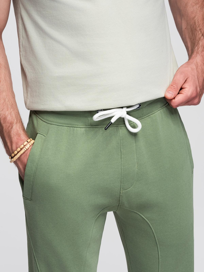 Spodnie męskie dresowe typu jogger - zielone V3 OM-PABS-0173