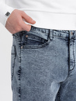 Męskie spodnie jeansowe marmurkowe z surowo wykończoną nogawką SLIM FIT - ciemnoniebieskie V4 OM-PADP-0146