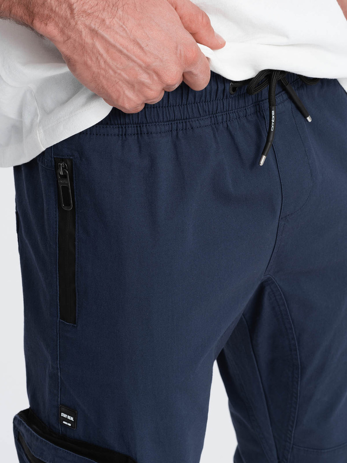 Męskie spodnie JOGGERY z zapinanymi kieszeniami cargo - granatowe V5 OM-PAJO-0135